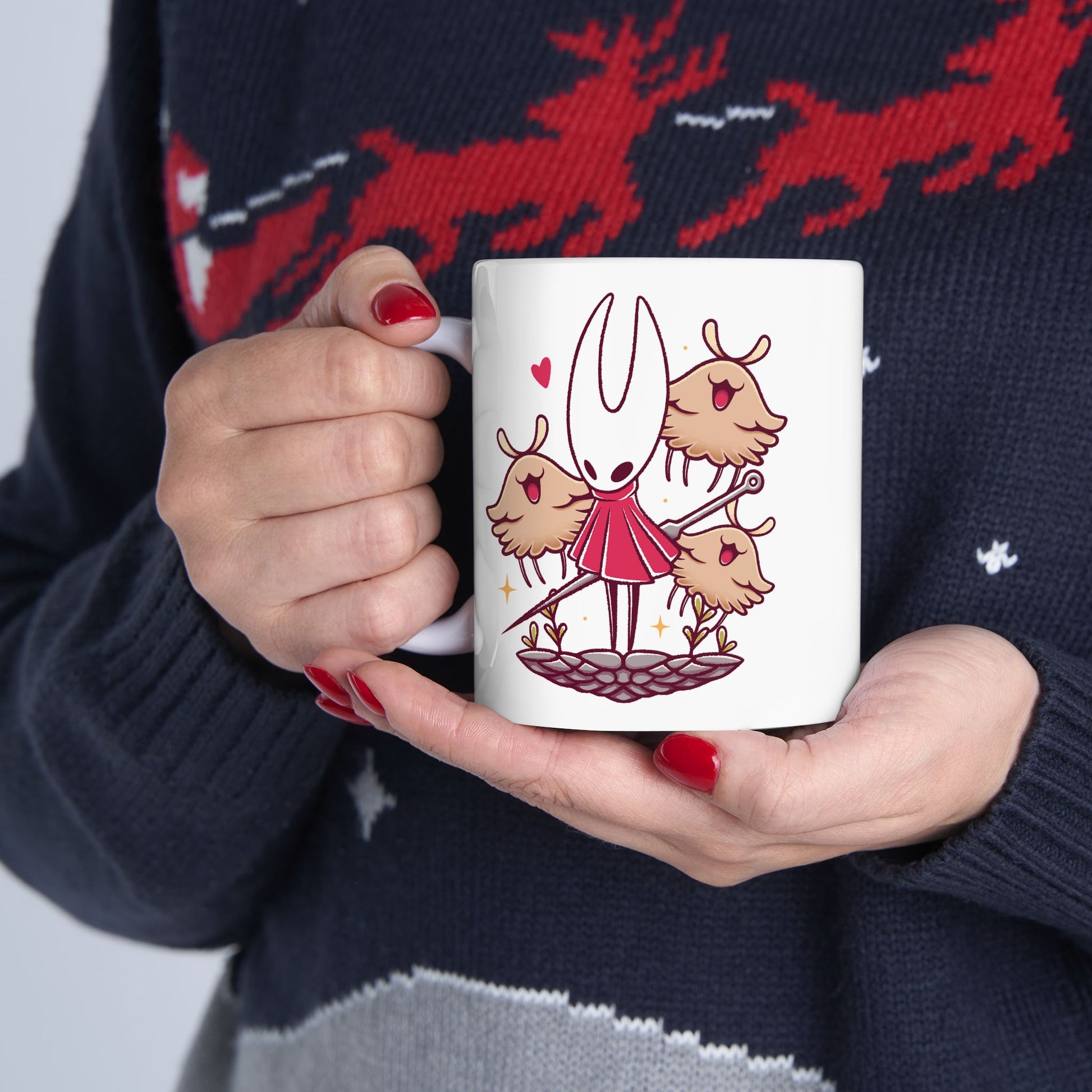 High-quality ceramic mug featuring Hornet and the Lost Fleas from Hollow Knight: Silksong in a cute watercolor art style. This kawaii-inspired design is perfect for indie game fans who love charming characters, cozy aesthetics, and collectible drinkware. Ideal for coffee or tea, the mug’s vibrant print and smooth ceramic finish make it a must-have for Silksong fans, metroidvania lovers, and anyone who enjoys artistic gaming merchandise.