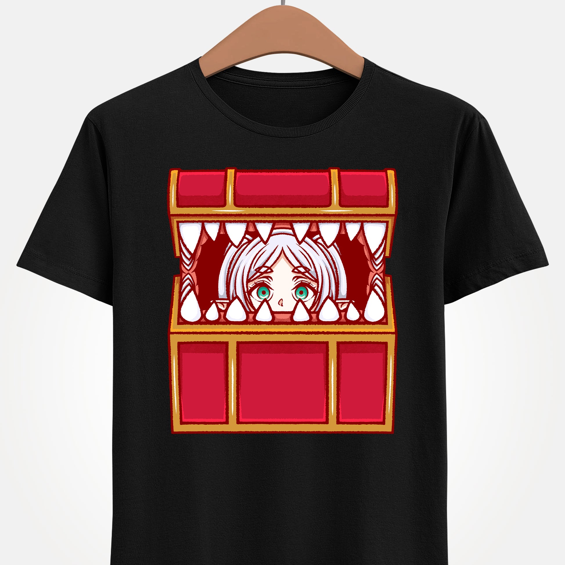 Frieren Mimic t-shirt inspired by Sōsō no Frieren: Beyond Journey’s End, featuring the elf mage protagonist being playfully eaten by a treasure chest mimic in a cute kawaii art style. This unisex anime shirt captures the viral meme loved by fans across the internet. Perfect fantasy anime merch for collectors, otaku enthusiasts, and fans of Frieren who enjoy funny dungeon moments and RPG-inspired designs.