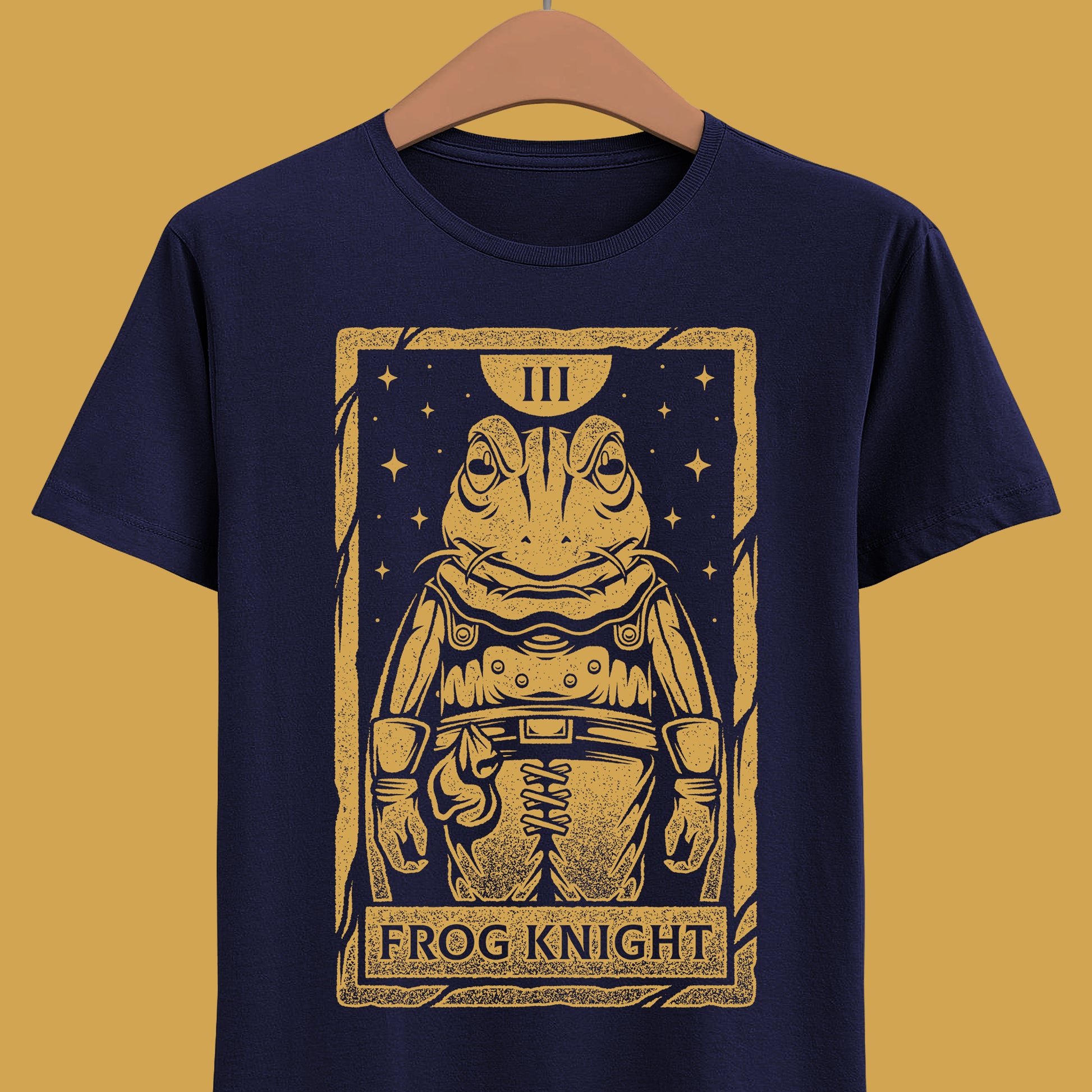 Glenn Frog Chrono Trigger tarot t-shirt inspired by the classic JRPG Chrono Trigger, originally released on SNES and PlayStation. Retro gaming apparel featuring a vintage tarot card illustration of Frog in a one-ink monochrome style. Nostalgic retrogaming design ideal for fans of Chrono Trigger merch, JRPG t-shirts, RPG video games, medieval fantasy characters, and classic SNES and PS1 gaming culture. Perfect collector shirt for retro RPG and vintage art lovers. Glenn frog chrono trigger t-shirt