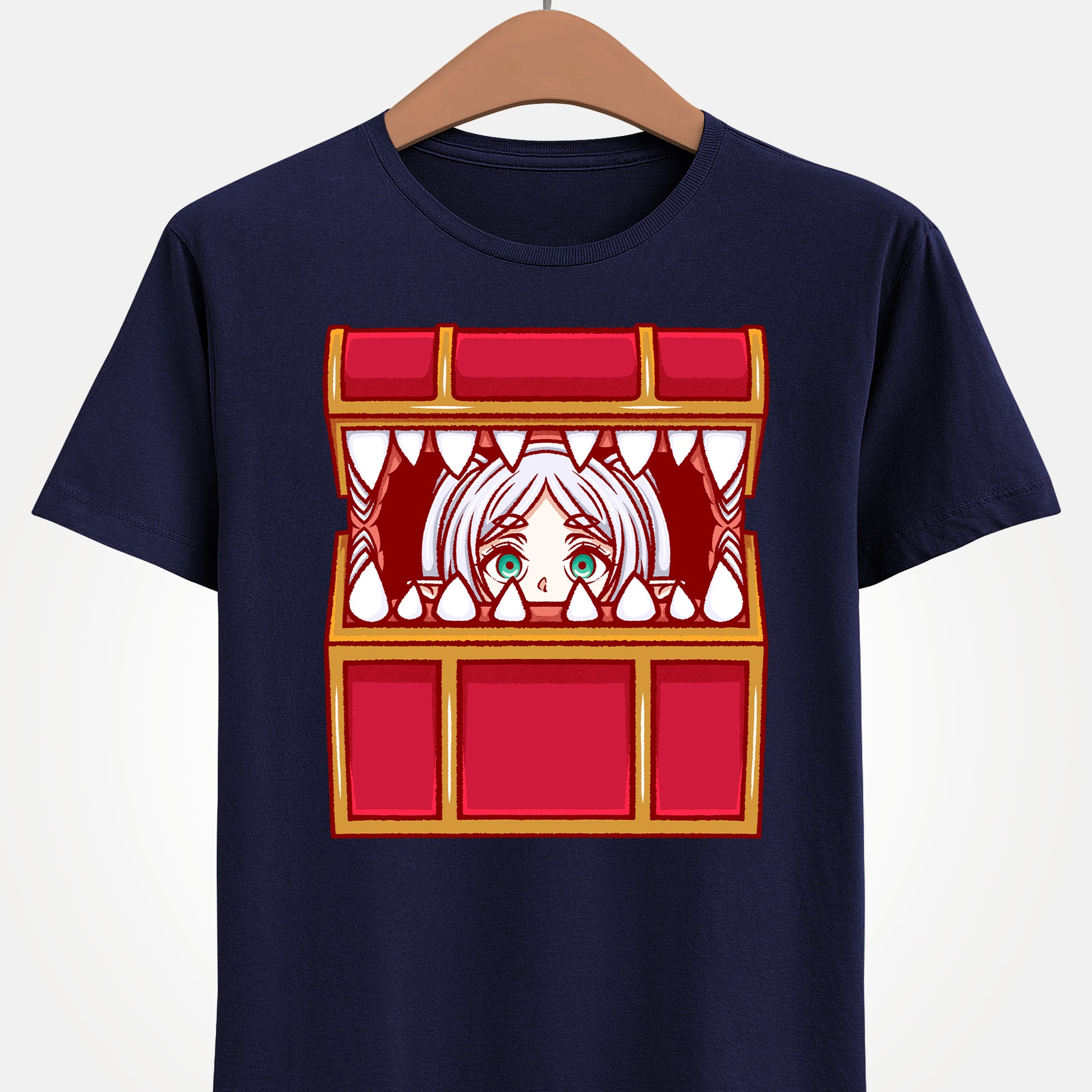 Frieren Mimic t-shirt inspired by Sōsō no Frieren: Beyond Journey’s End, featuring the elf mage protagonist being playfully eaten by a treasure chest mimic in a cute kawaii art style. This unisex anime shirt captures the viral meme loved by fans across the internet. Perfect fantasy anime merch for collectors, otaku enthusiasts, and fans of Frieren who enjoy funny dungeon moments and RPG-inspired designs.