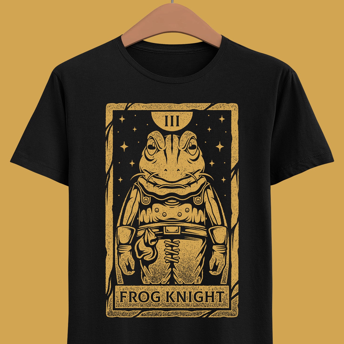 Glenn Frog Chrono Trigger tarot t-shirt inspired by the classic JRPG Chrono Trigger, originally released on SNES and PlayStation. Retro gaming apparel featuring a vintage tarot card illustration of Frog in a one-ink monochrome style. Nostalgic retrogaming design ideal for fans of Chrono Trigger merch, JRPG t-shirts, RPG video games, medieval fantasy characters, and classic SNES and PS1 gaming culture. Perfect collector shirt for retro RPG and vintage art lovers. Glenn frog chrono trigger t-shirt