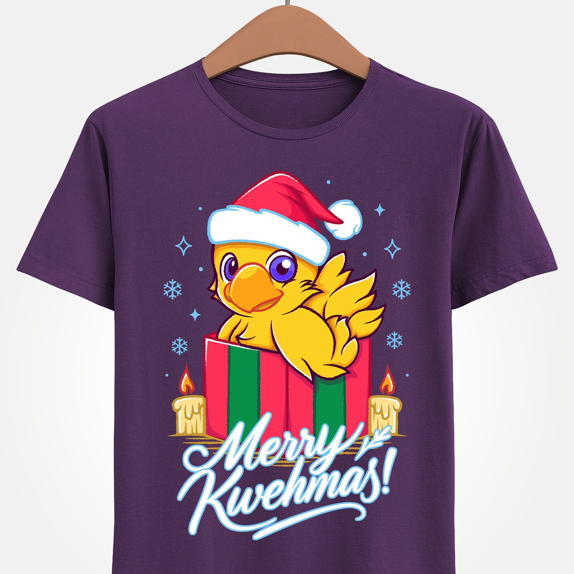 High-quality T-shirt featuring a cute Chocobo from the Final Fantasy series sitting inside a Christmas gift box and wearing a festive Santa hat. The design blends JRPG charm with adorable holiday aesthetics, making it perfect for fans of Chocobos, Christmas gaming apparel, and cute kawaii art. Ideal for gifting, collectors, and gamers who enjoy cozy festive clothing. Soft unisex tee suitable for daily wear during the holiday season. cute chocobo kawaii t-shirt, final fantasy christmas t-shirt