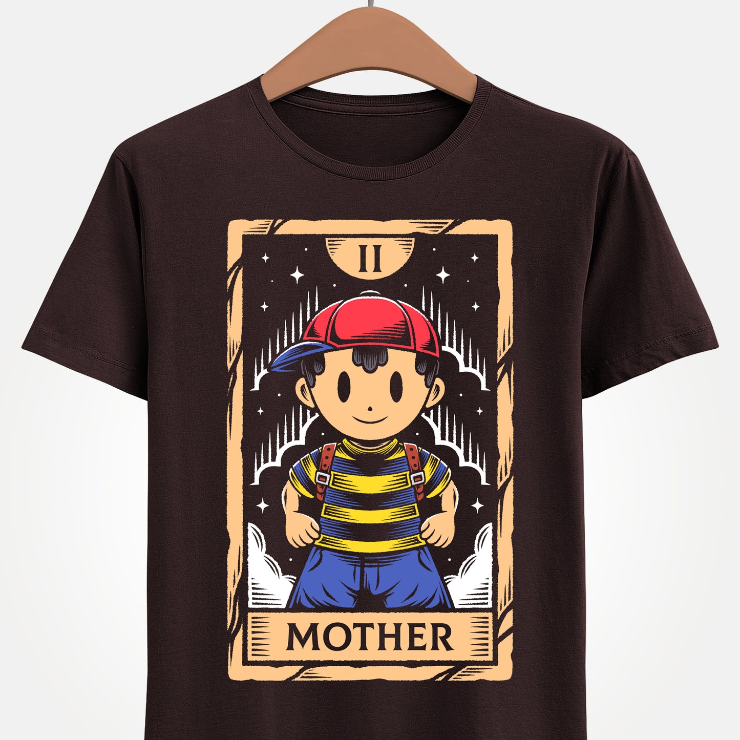 Discover this Ness tarot card t-shirt inspired by EarthBound (Mother 2) video game. A retro RPG design featuring the iconic PSI powered hero in a mystical tarot card illustration. This shirt is perfect retrogamers who love Earthbound game.