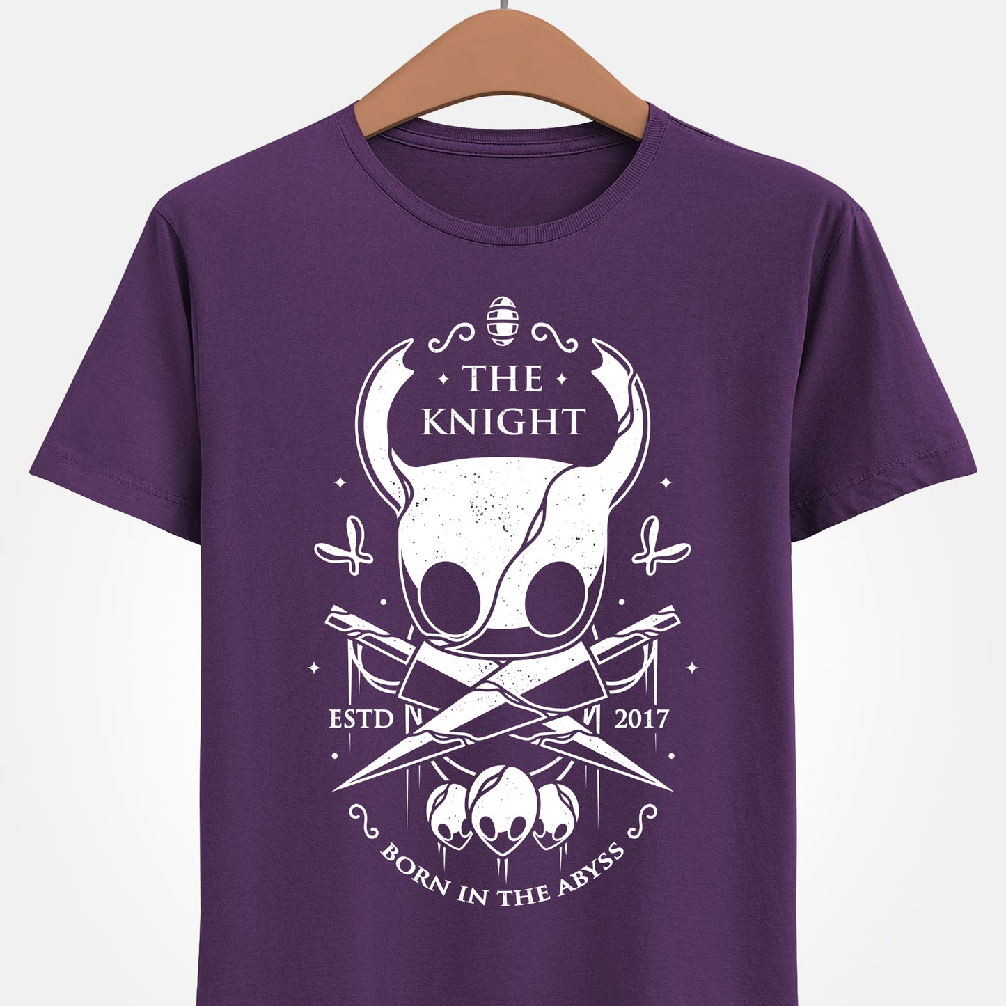 The Knight Hollow Knight t-shirt featuring the iconic Vessel from the indie metroidvania video game Hollow Knight. Atmospheric gamer apparel inspired by Hallownest, perfect for fans of The Knight, indie games, dark fantasy aesthetics, and Hollow Knight merch. Unisex video game shirt ideal as a gift for gamers and collectors. hollow knight merch, hollow knight the knight t-shirt, the knight hollow knight video game t-shirt, hollow knight exclusive merch, hollow knight silksong t-shirt