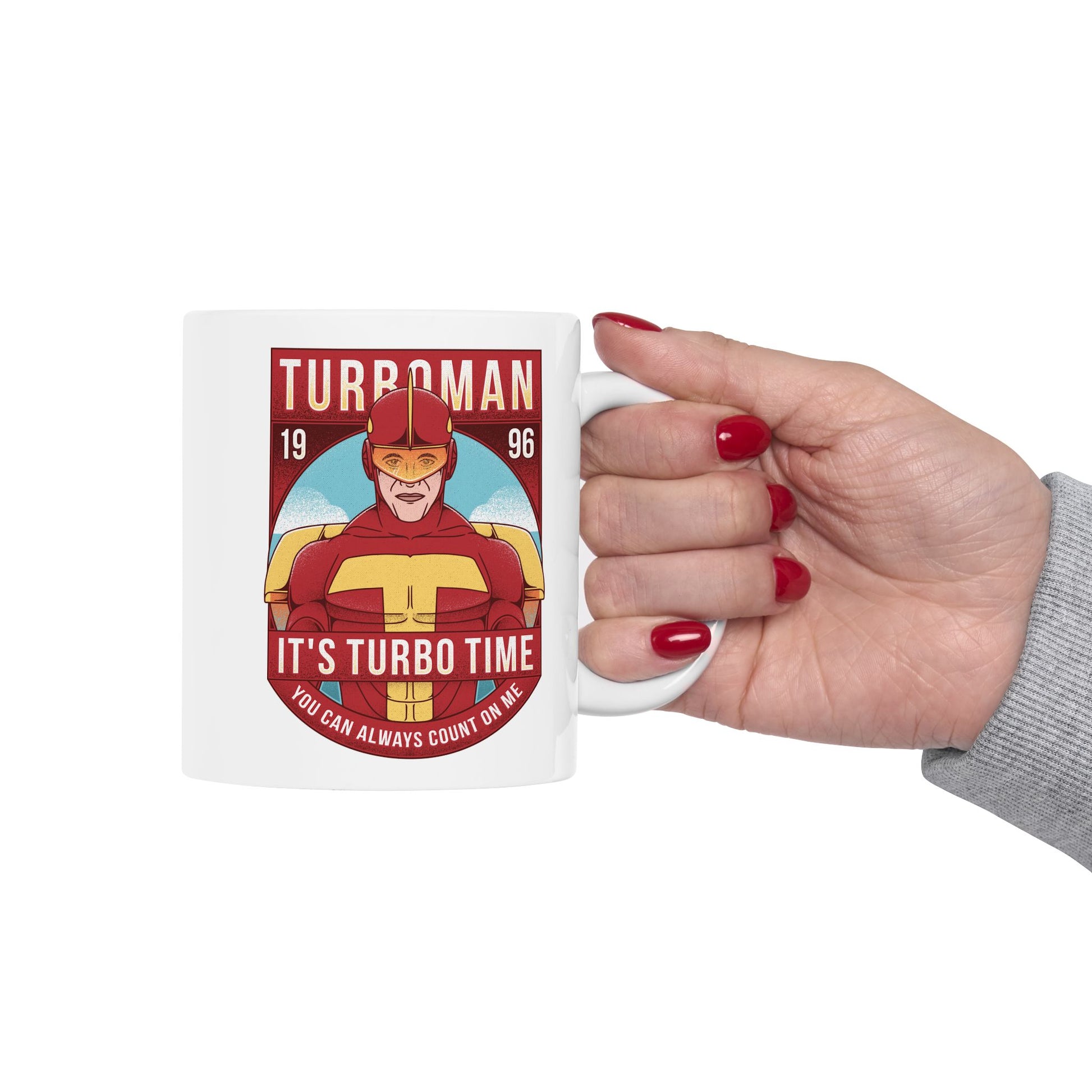 High-quality ceramic mug featuring Turbo Man from the 90s Christmas movie Jingle All the Way. The design captures the iconic superhero parody style, perfect for nostalgic fans, movie collectors, and lovers of retro holiday films. Ideal as a festive gift, this durable mug works for coffee, tea, or display. Bright colors and detailed artwork make it a must-have for anyone who loves Turbo Man and classic Christmas comedies.