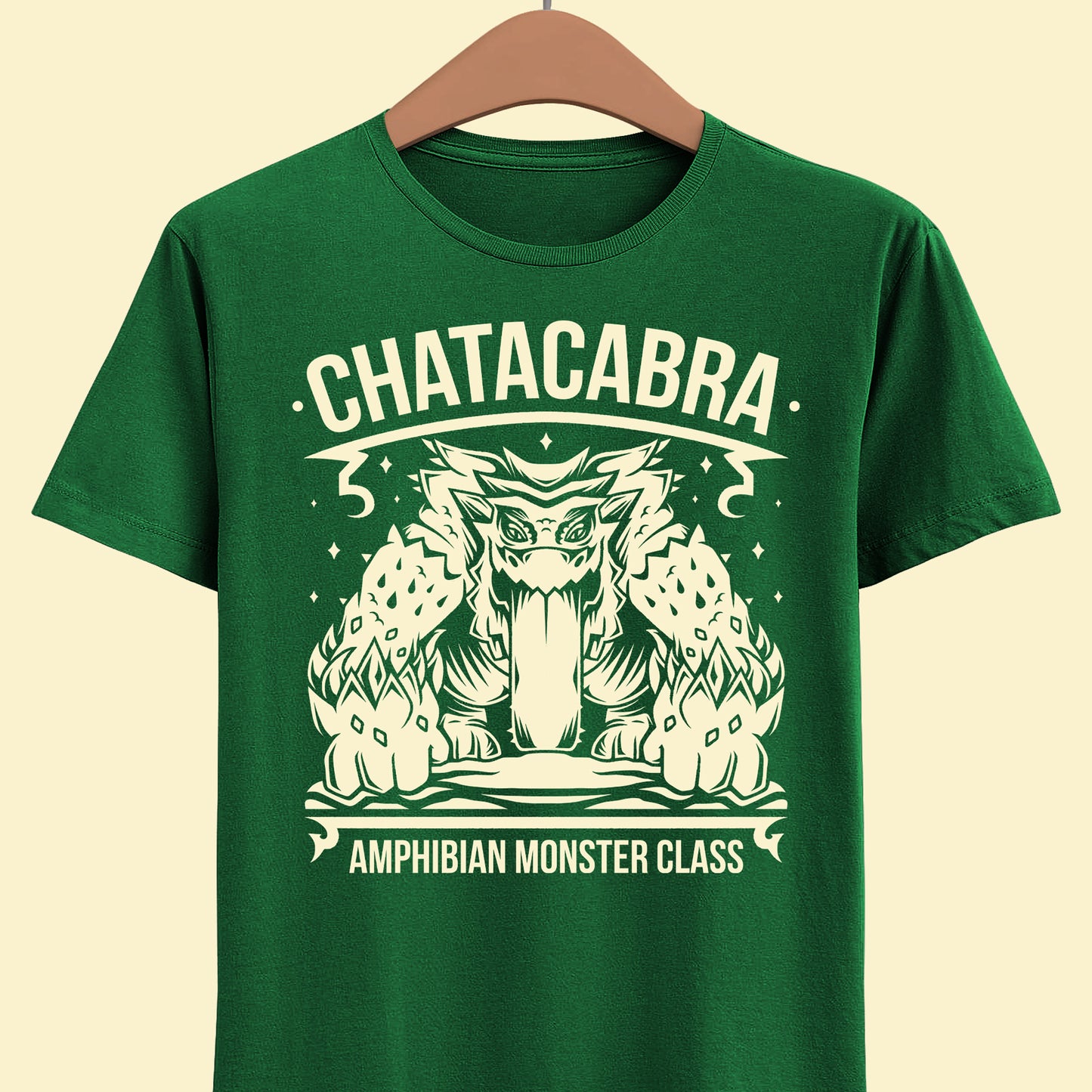 Design inspired Chatacabra amphibian monster class from Monster Hunter Wilds video game.

monster hunter, monster hunter wilds, monster hunter world, mh, mhwilds, MHWs, MHWilds, キャラメイク, arkveld, lala barina, palico, palicoes, shirt, tee, t-shirt, gaming clothing, clothing brand, gamer clothes, video games, rpg video game, video game