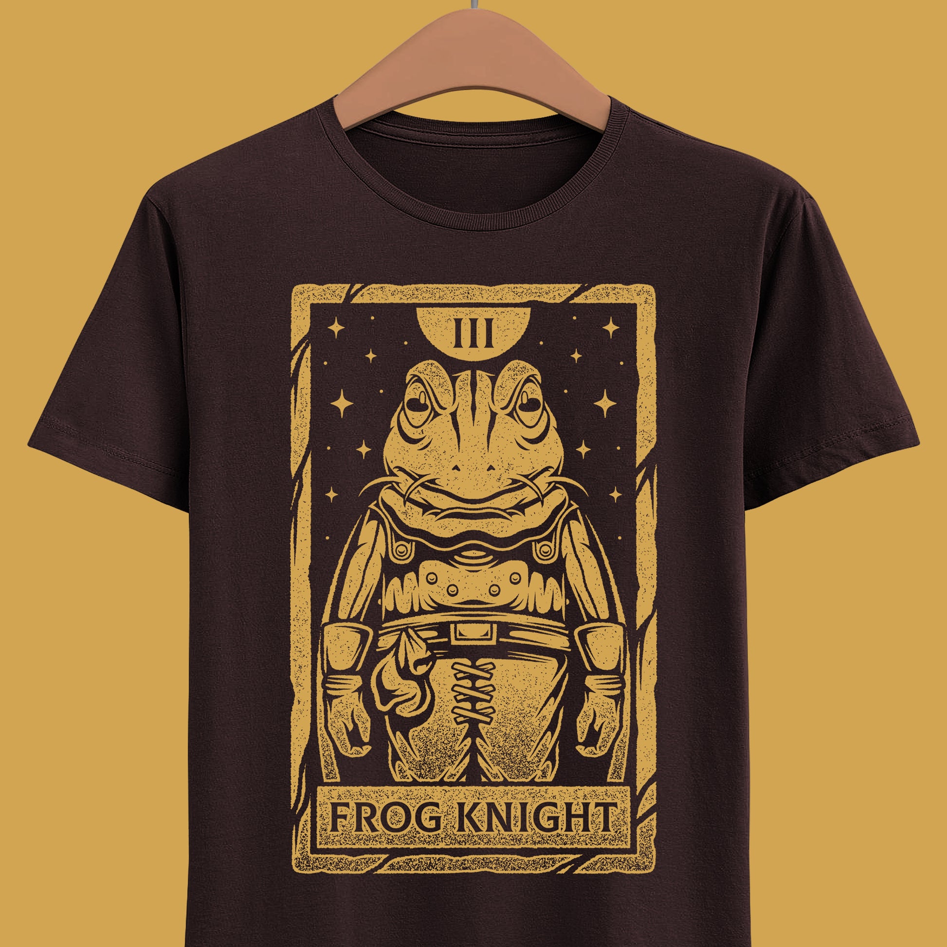 Glenn Frog Chrono Trigger tarot t-shirt inspired by the classic JRPG Chrono Trigger, originally released on SNES and PlayStation. Retro gaming apparel featuring a vintage tarot card illustration of Frog in a one-ink monochrome style. Nostalgic retrogaming design ideal for fans of Chrono Trigger merch, JRPG t-shirts, RPG video games, medieval fantasy characters, and classic SNES and PS1 gaming culture. Perfect collector shirt for retro RPG and vintage art lovers. Glenn frog chrono trigger t-shirt