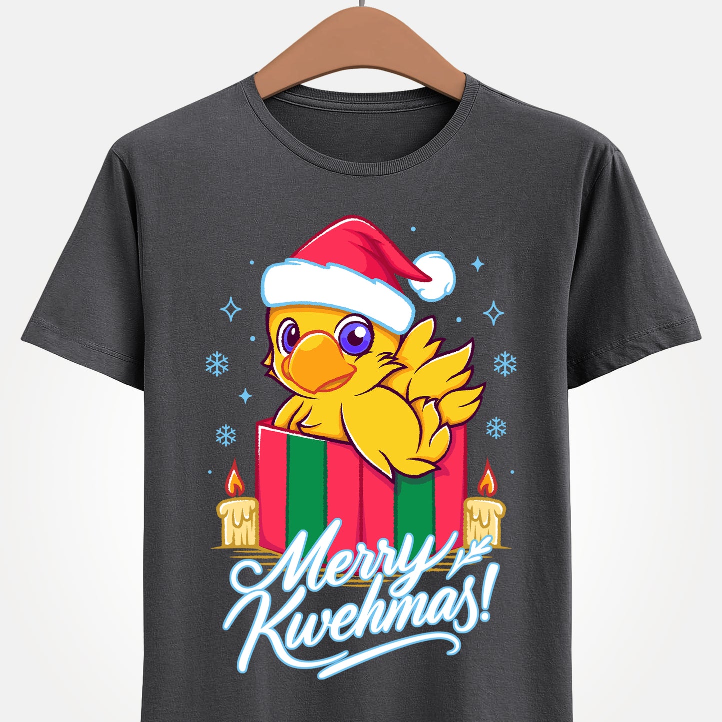 High-quality T-shirt featuring a cute Chocobo from the Final Fantasy series sitting inside a Christmas gift box and wearing a festive Santa hat. The design blends JRPG charm with adorable holiday aesthetics, making it perfect for fans of Chocobos, Christmas gaming apparel, and cute kawaii art. Ideal for gifting, collectors, and gamers who enjoy cozy festive clothing. Soft unisex tee suitable for daily wear during the holiday season. cute chocobo kawaii t-shirt, final fantasy christmas t-shirt