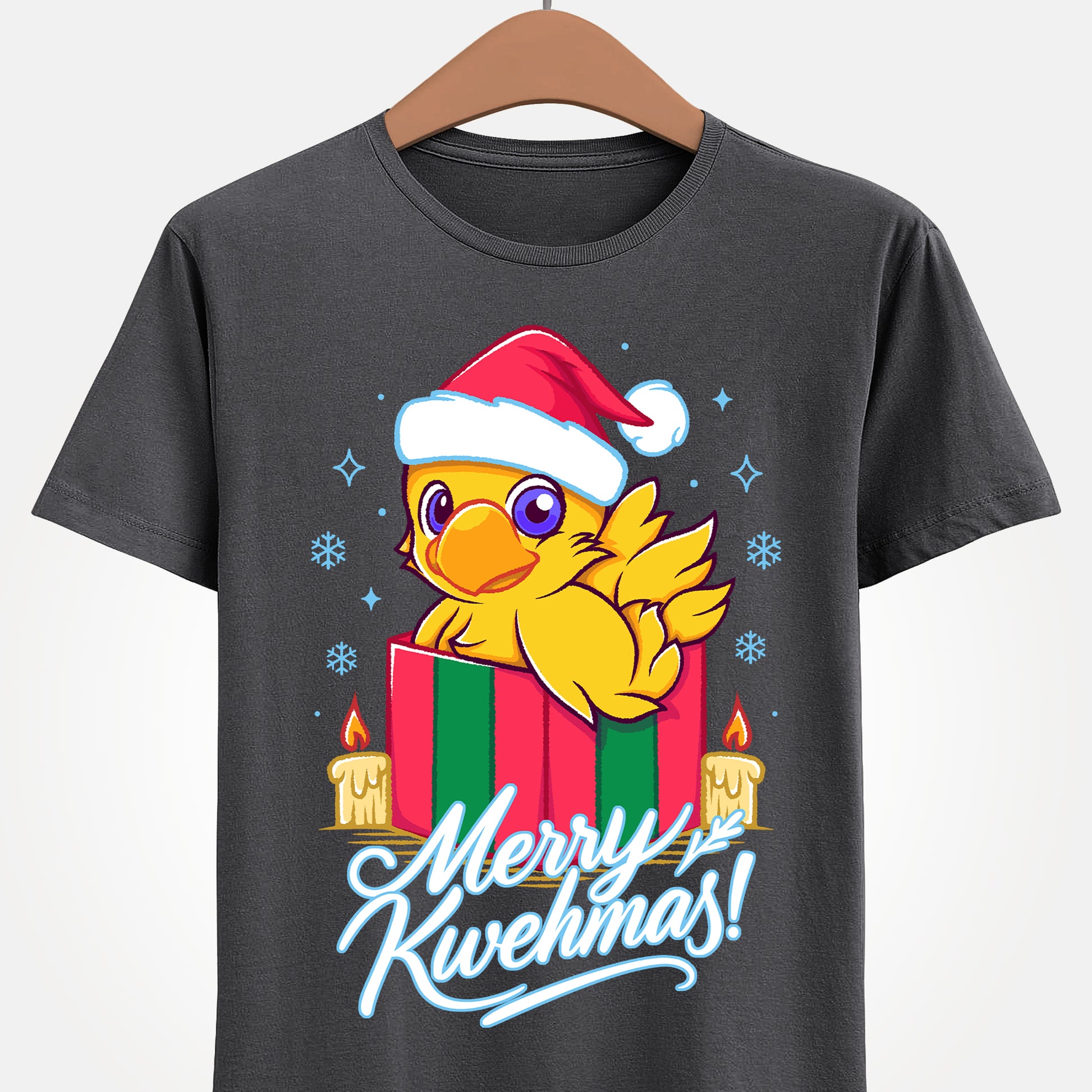 High-quality T-shirt featuring a cute Chocobo from the Final Fantasy series sitting inside a Christmas gift box and wearing a festive Santa hat. The design blends JRPG charm with adorable holiday aesthetics, making it perfect for fans of Chocobos, Christmas gaming apparel, and cute kawaii art. Ideal for gifting, collectors, and gamers who enjoy cozy festive clothing. Soft unisex tee suitable for daily wear during the holiday season. cute chocobo kawaii t-shirt, final fantasy christmas t-shirt