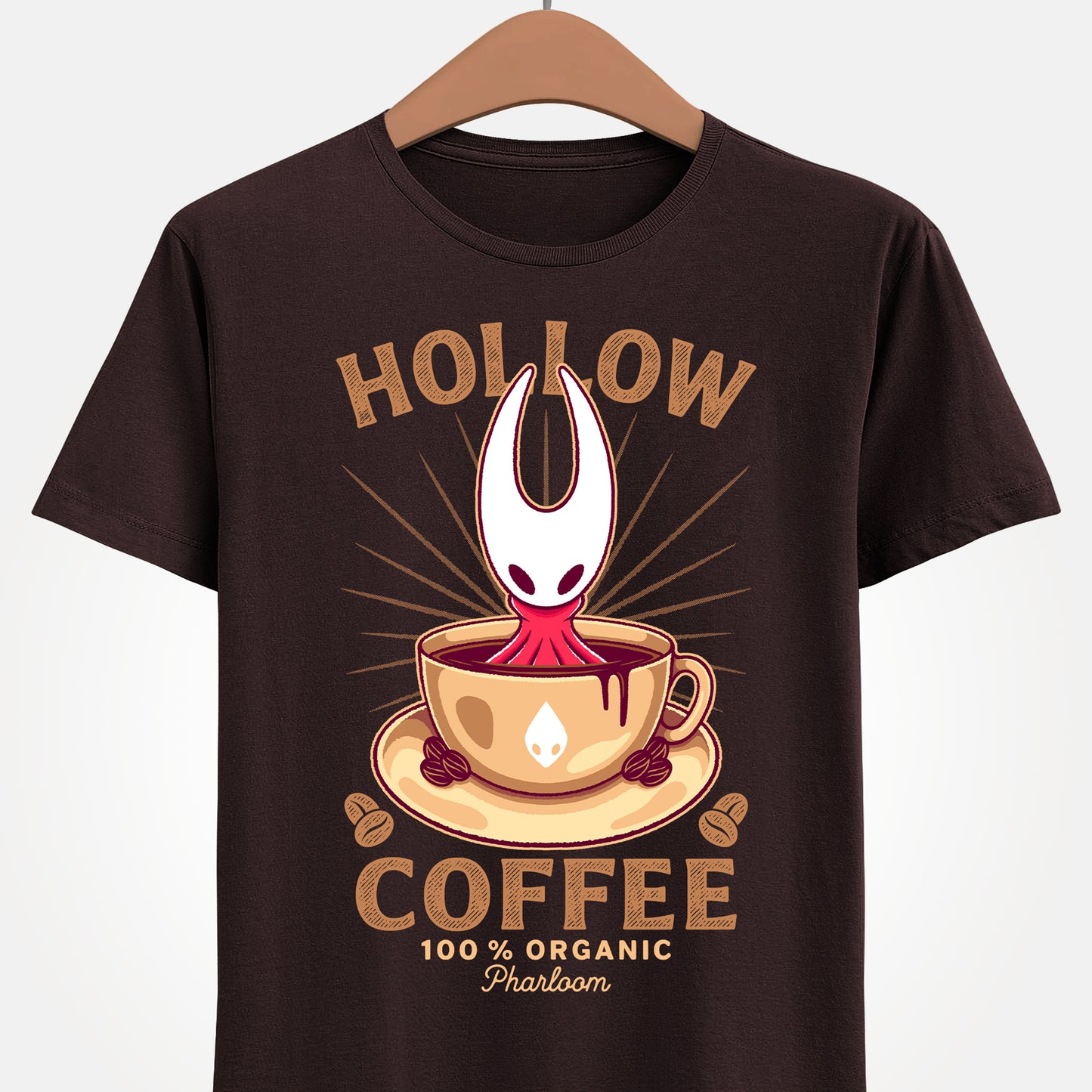 Cute T-shirt featuring Hornet from Hollow Knight Silksong sitting inside a warm coffee mug in a kawaii art style. This cozy design blends indie game aesthetics with coffee-lover vibes, perfect for fans of Hornet, Silksong, and Hollow Knight. The illustration uses soft colors and adorable details to appeal to cute-art lovers, cozy gamers, and collectors looking for unique fan-made merch. Ideal for everyday wear and gamer-themed outfits. hollow knight silksong merch, hollow knight coffee t-shirt