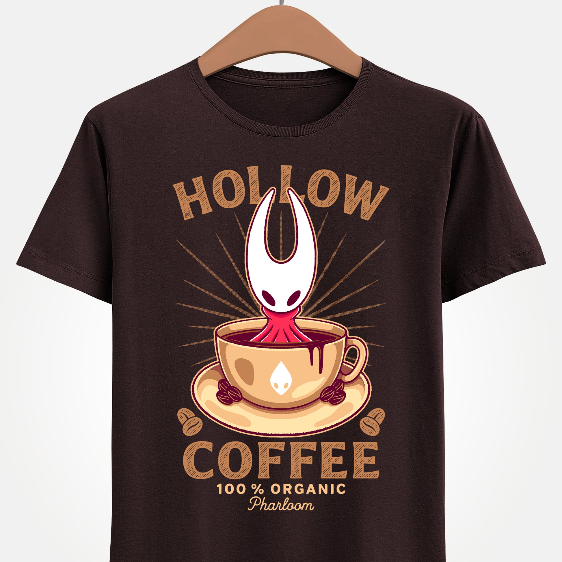 Cute T-shirt featuring Hornet from Hollow Knight Silksong sitting inside a warm coffee mug in a kawaii art style. This cozy design blends indie game aesthetics with coffee-lover vibes, perfect for fans of Hornet, Silksong, and Hollow Knight. The illustration uses soft colors and adorable details to appeal to cute-art lovers, cozy gamers, and collectors looking for unique fan-made merch. Ideal for everyday wear and gamer-themed outfits. hollow knight silksong merch, hollow knight coffee t-shirt