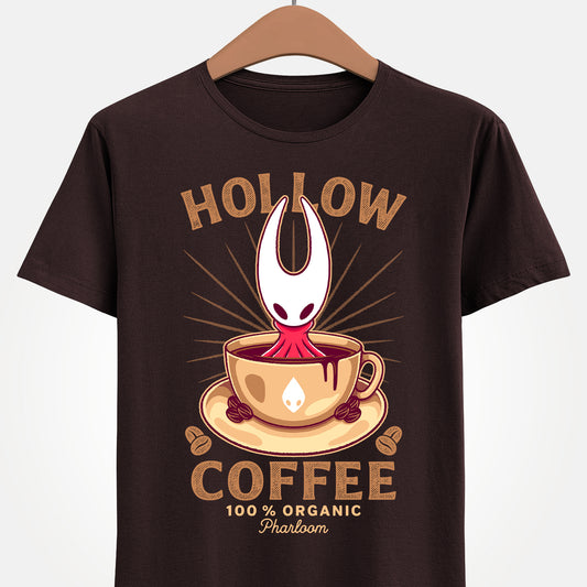 Cute T-shirt featuring Hornet from Hollow Knight Silksong sitting inside a warm coffee mug in a kawaii art style. This cozy design blends indie game aesthetics with coffee-lover vibes, perfect for fans of Hornet, Silksong, and Hollow Knight. The illustration uses soft colors and adorable details to appeal to cute-art lovers, cozy gamers, and collectors looking for unique fan-made merch. Ideal for everyday wear and gamer-themed outfits. hollow knight silksong merch, hollow knight coffee t-shirt