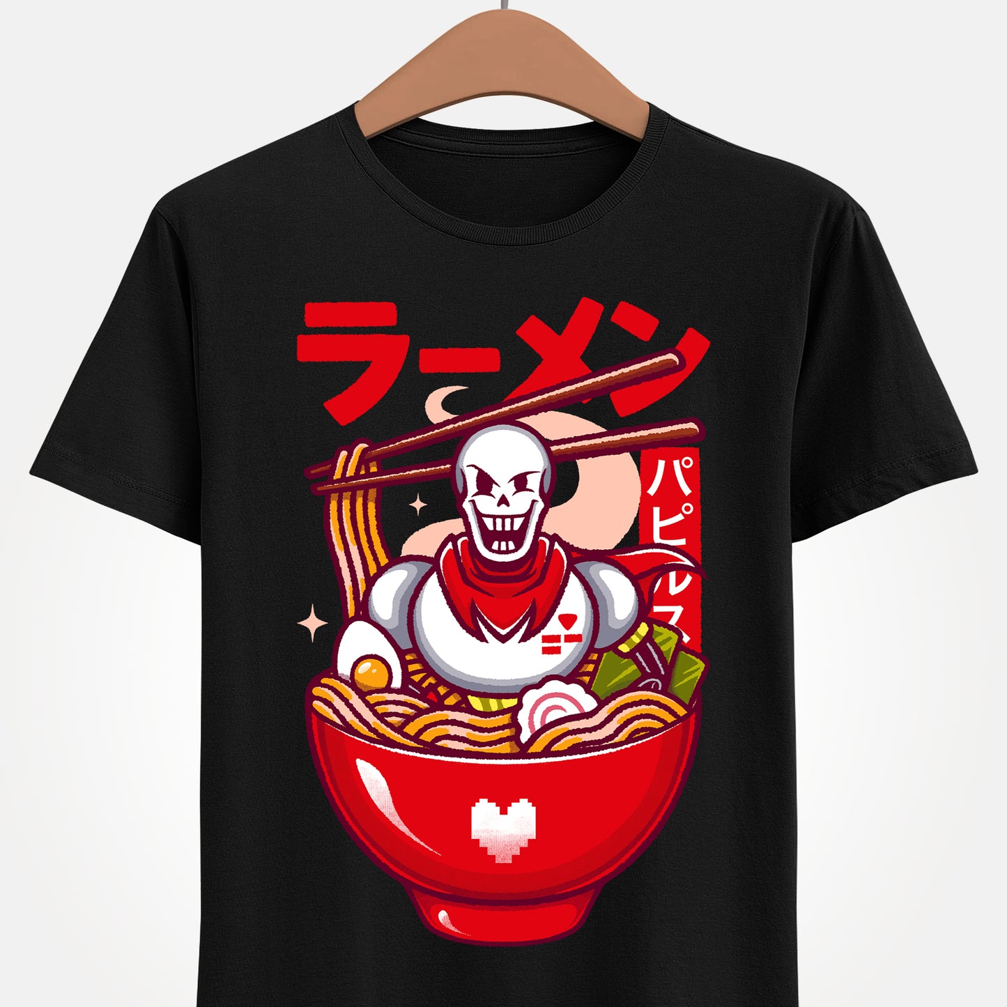 Image of a Papyrus T-shirt inspired by the indie game Undertale, featuring Papyrus sitting inside a Japanese ramen bowl in a cute kawaii art style. The design includes noodles, chopsticks and bright manga-style colors, perfect for fans of Papyrus, Sans, Undyne and the Undertale cast. Ideal for gamers who love Japanese food, ramen-themed apparel, geek culture, and unique Undertale merch with a playful aesthetic. papyrus undertale t-shirt, papyrus undertale video game merch, papyrus undertale tee