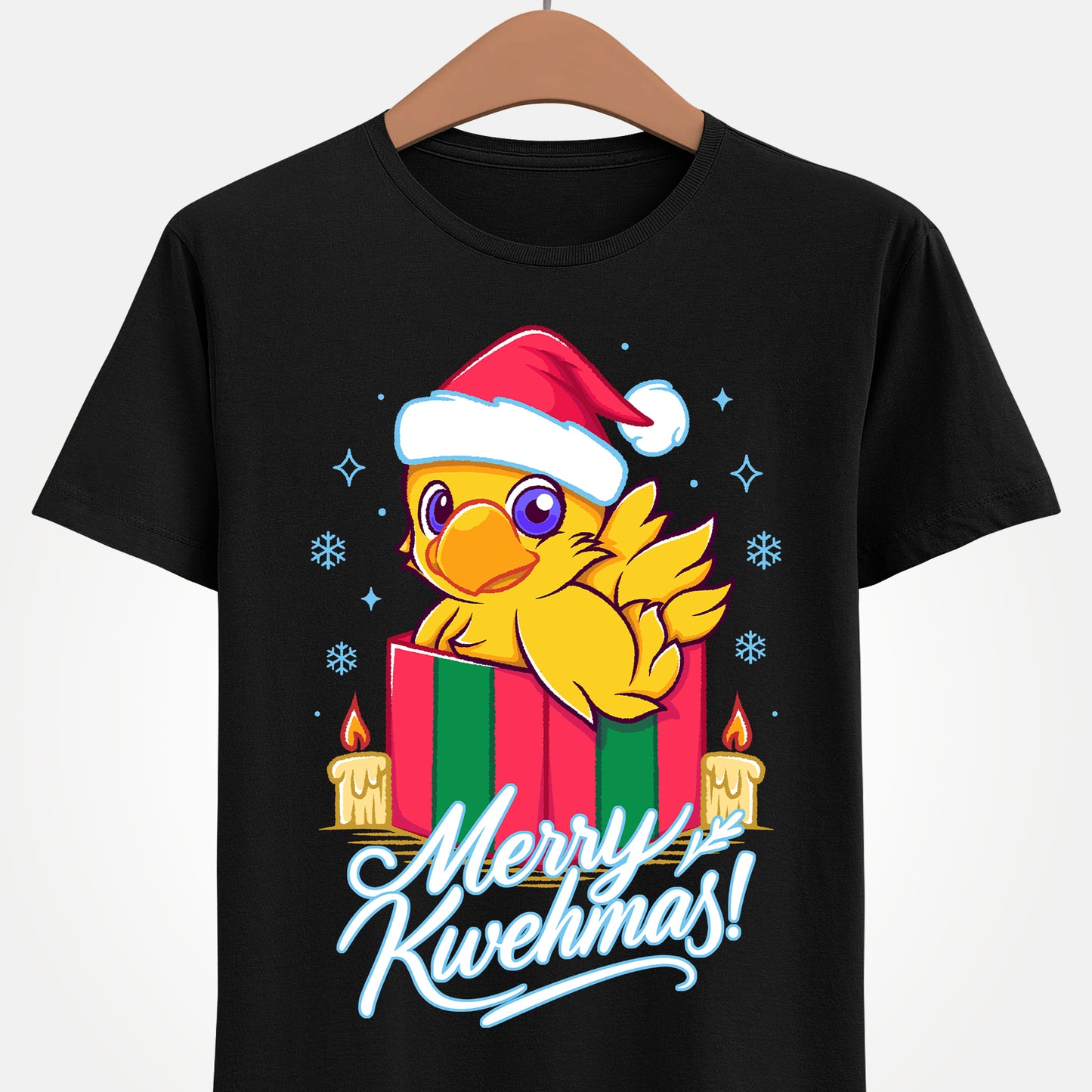 High-quality T-shirt featuring a cute Chocobo from the Final Fantasy series sitting inside a Christmas gift box and wearing a festive Santa hat. The design blends JRPG charm with adorable holiday aesthetics, making it perfect for fans of Chocobos, Christmas gaming apparel, and cute kawaii art. Ideal for gifting, collectors, and gamers who enjoy cozy festive clothing. Soft unisex tee suitable for daily wear during the holiday season. cute chocobo kawaii t-shirt, final fantasy christmas t-shirt