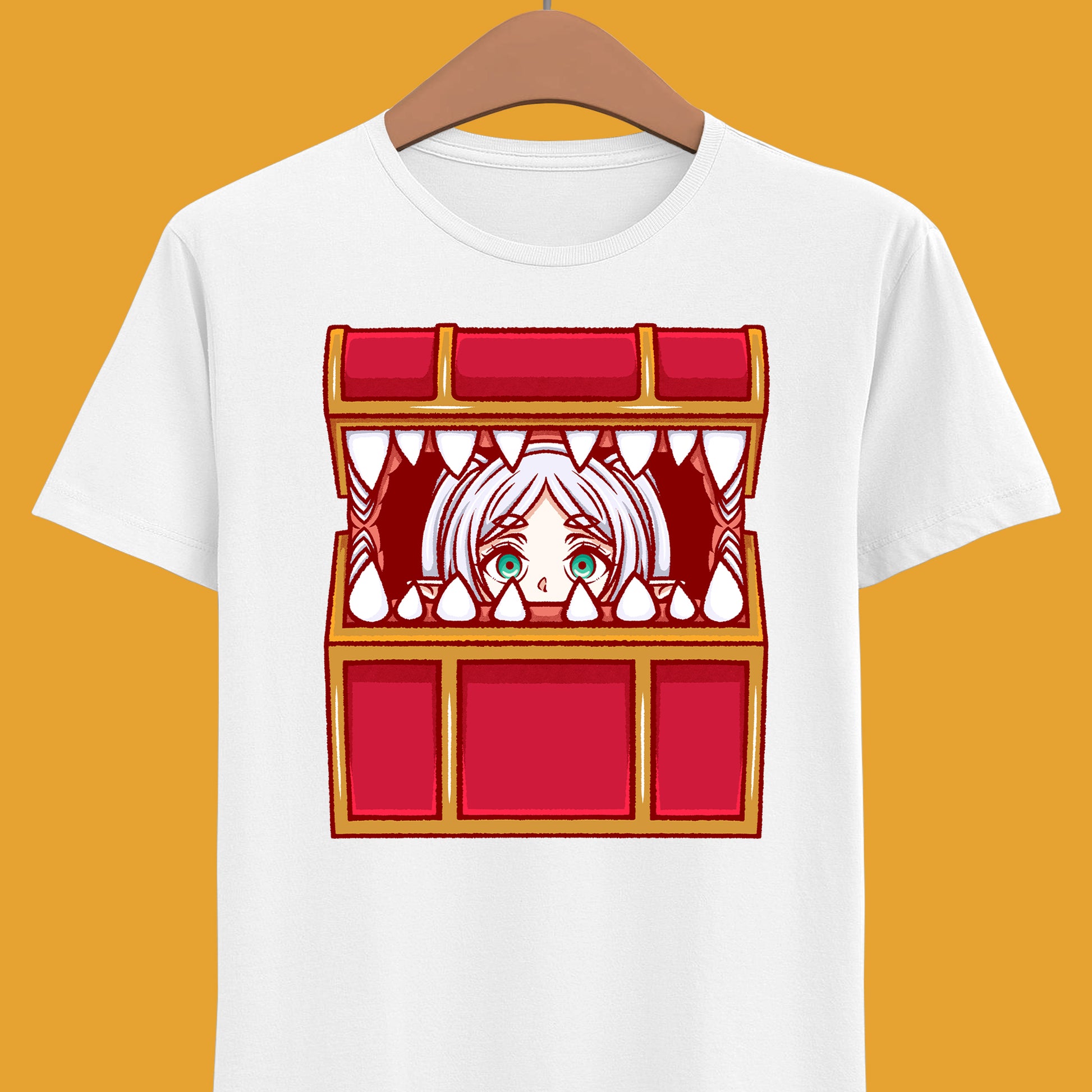 Frieren Mimic t-shirt inspired by Sōsō no Frieren: Beyond Journey’s End, featuring the elf mage protagonist being playfully eaten by a treasure chest mimic in a cute kawaii art style. This unisex anime shirt captures the viral meme loved by fans across the internet. Perfect fantasy anime merch for collectors, otaku enthusiasts, and fans of Frieren who enjoy funny dungeon moments and RPG-inspired designs.