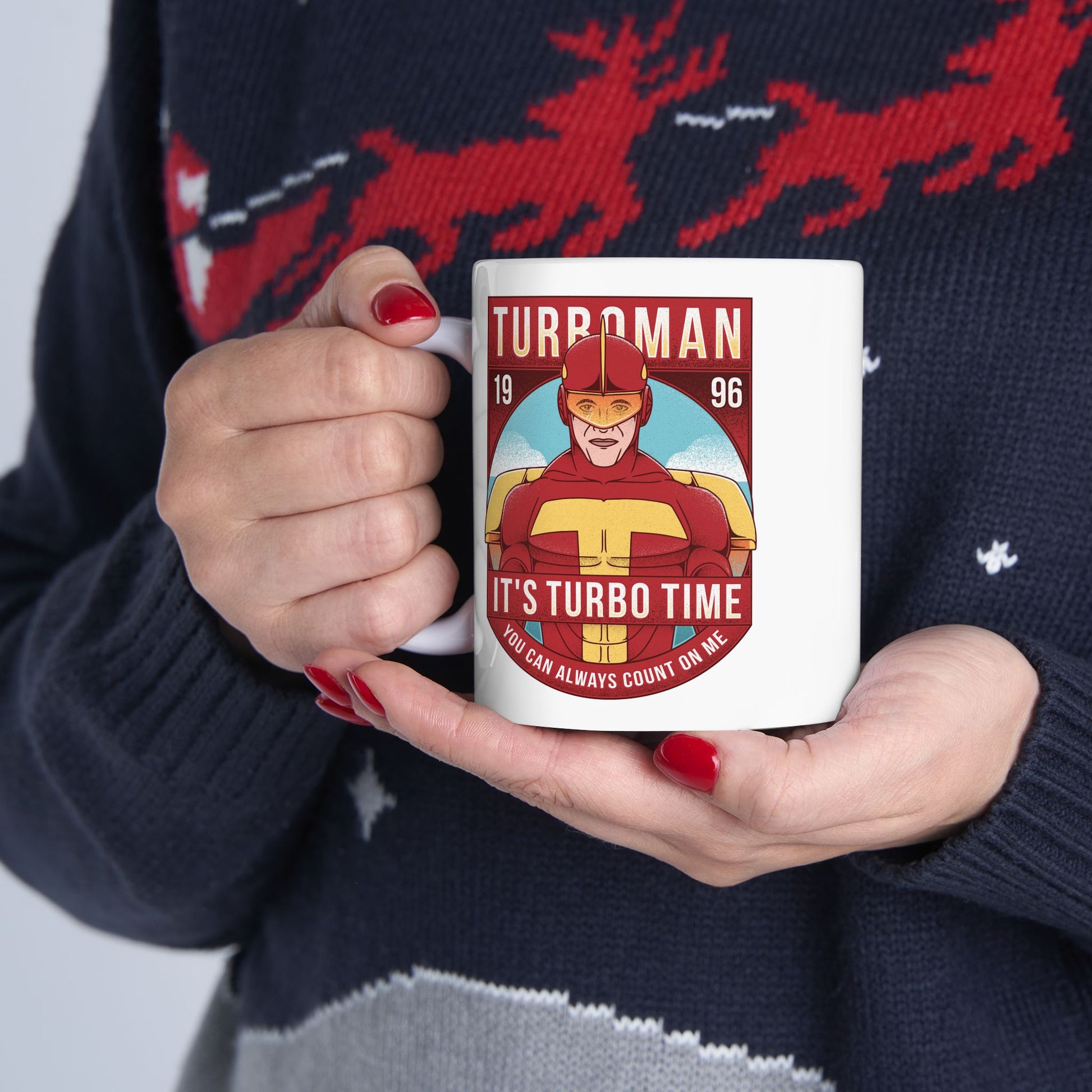 High-quality ceramic mug featuring Turbo Man from the 90s Christmas movie Jingle All the Way. The design captures the iconic superhero parody style, perfect for nostalgic fans, movie collectors, and lovers of retro holiday films. Ideal as a festive gift, this durable mug works for coffee, tea, or display. Bright colors and detailed artwork make it a must-have for anyone who loves Turbo Man and classic Christmas comedies.