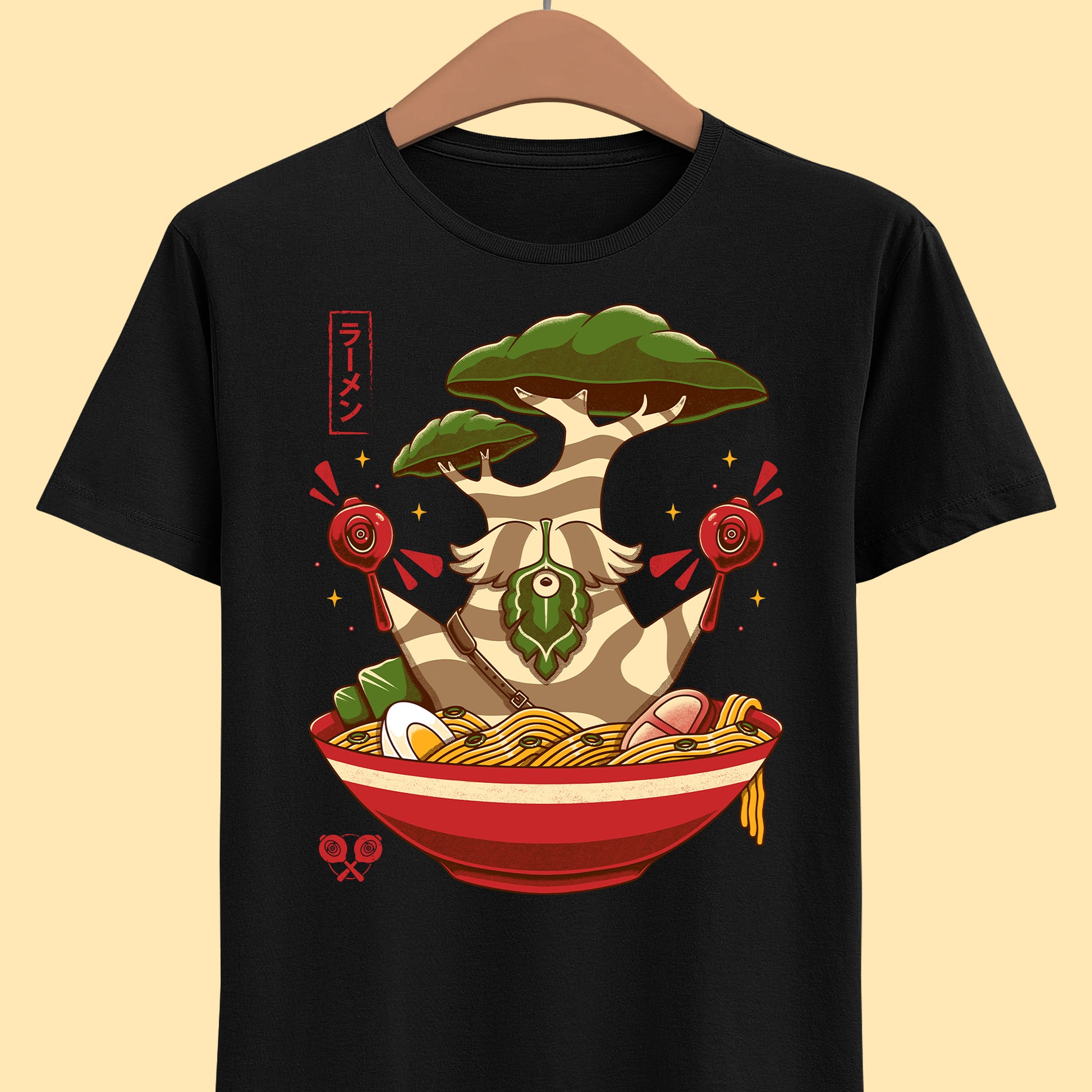 Hestu Korok t-shirt from The Legend of Zelda Breath of the Wild featuring Hestu doing the Shalaka Dance inside a ramen noodle bowl in cute gamer style.