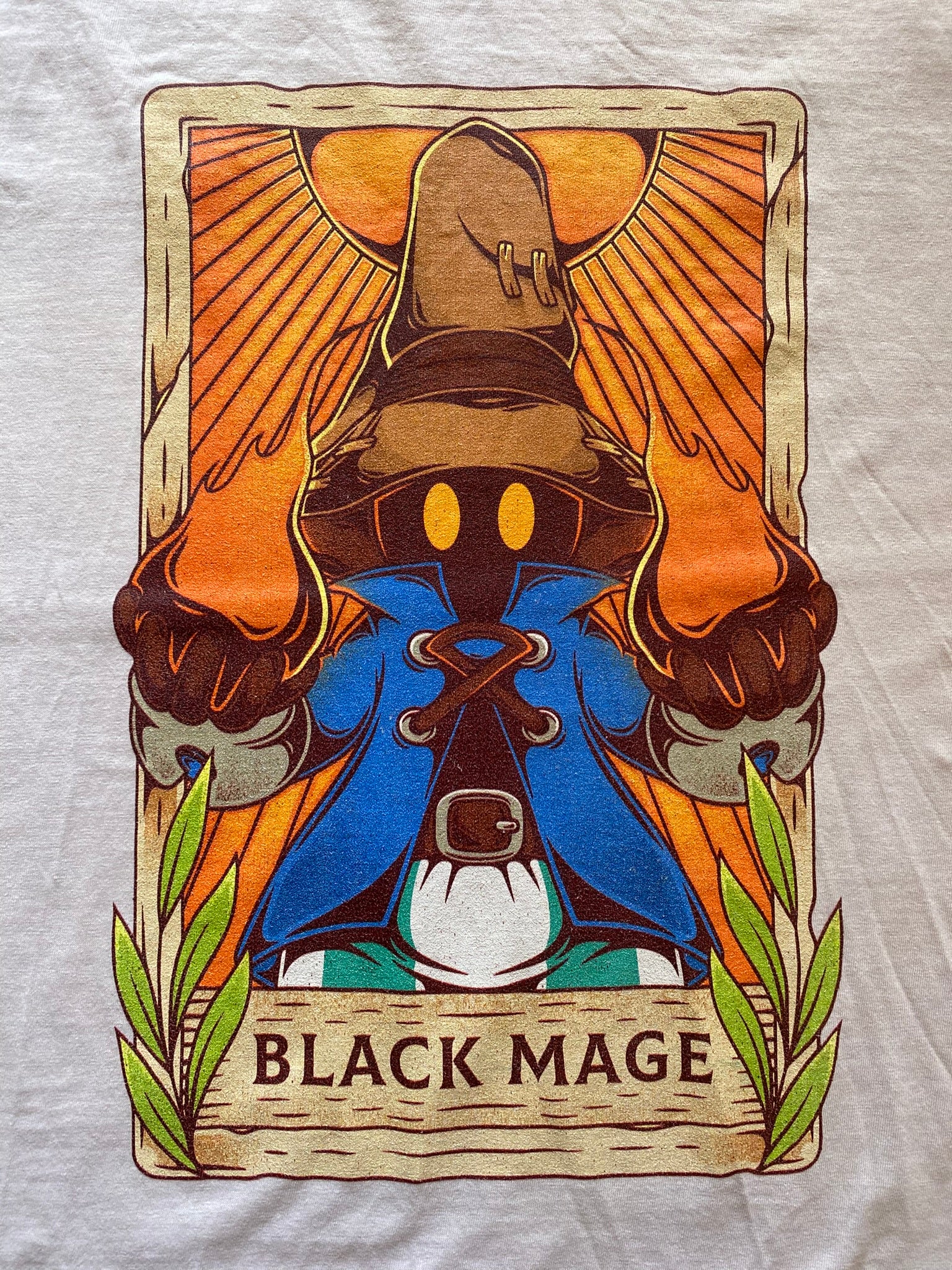 Real printed FFIX Vivi Ornitier tarot card inspired T-shirt showing vibrant colors, sharp lines and DTG print quality